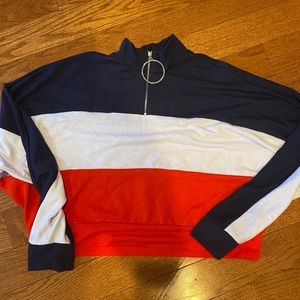 A blue, white and red top